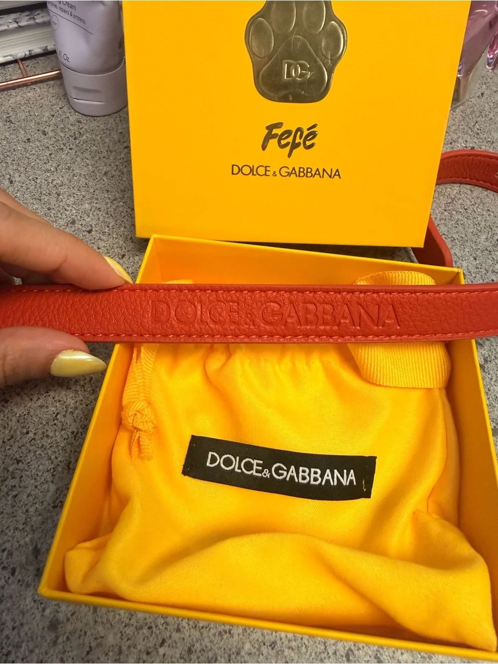 Dolce & Gabbana Red Leather Strap with Yellow Branded Pouch with out charm.